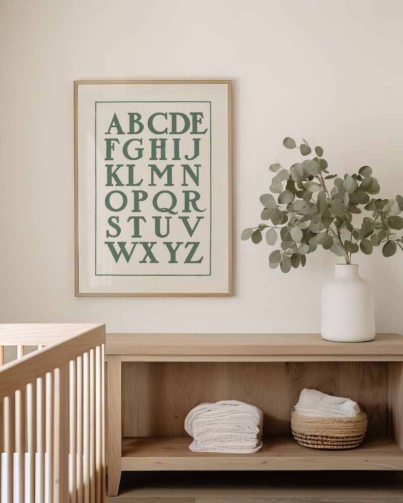 Charming vintage letter artwork featuring and hand drawn alphabet in prominent capitals. This beautiful sage green ABC poster print is perfect for nursery or playroom decor. Instantly download, print, and frame!