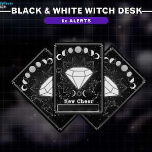May include: Black and white witch desk alert cards with a diamond and moon phases design. The card reads "New Cheer".