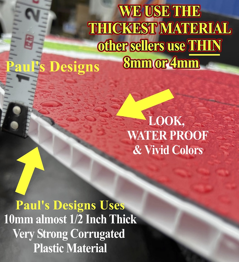 May include: Close-up of a red and white corrugated plastic sign with water droplets on the surface. The sign reads "Paul's Designs Uses 10mm almost 1/2 Inch Thick Very Strong Corrugated Plastic Material". The sign is being compared to a ruler, showing that it is thicker than other signs.