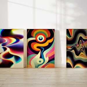 May include: Three abstract paintings with colourful, swirling patterns. The paintings are framed in gold and are hanging on a white wall.