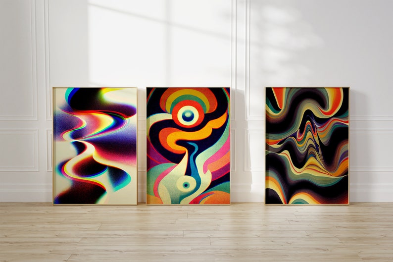 May include: Three abstract paintings with colourful, swirling patterns. The paintings are framed in gold and are hanging on a white wall.