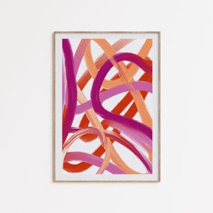May include: Abstract art print with pink, orange, and red brushstrokes in a wooden frame.