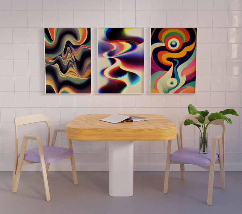 May include: Three abstract art prints with colourful, swirling patterns hang on a white tiled wall above a wooden table with two light purple chairs. A potted plant sits on the table.