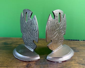 Sujetalibros vintage de latón macizo con forma de dólar de arena y diseño náutico.