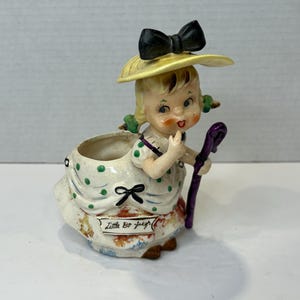 Vintage Little Bo Peep i en grön prickig klänning keramikkruka