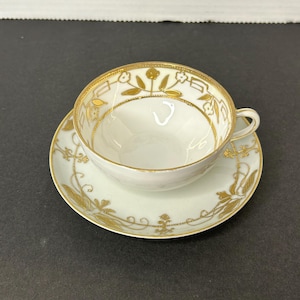 Vintage Handpainted Nippon Porcelain Embossed Gold Tea Cup and Saucer