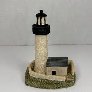 Vintage Small Resin Fenced in White Lighthouse Figurine