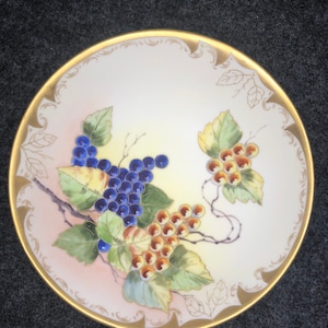 Vintage from D and C Limoges of France this Porcelain Plate adorned with Gold trim and beautiful Grape and vine scene