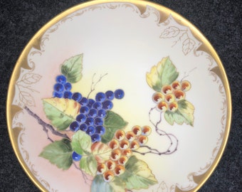 Vintage from D and C Limoges of France this Porcelain Plate adorned with Gold trim and beautiful Grape and vine scene