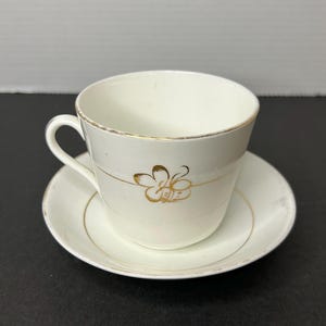 Vintage Gold Detail Cloverleaf Tea Leaf on Plain White Porcelain Tea Cup and Saucer