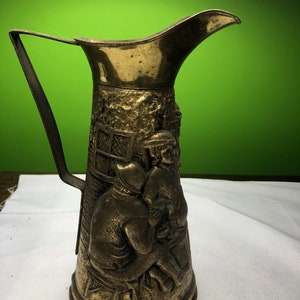 Vintage Brass Pitcher with Beautifully embossed English Pub Scene Great Patina