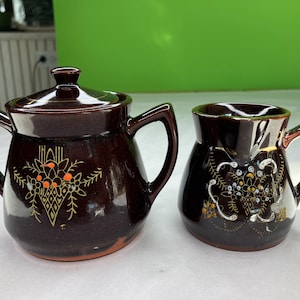 Vintage Red Stoneware Creamer and Sugar Set with hand painted details