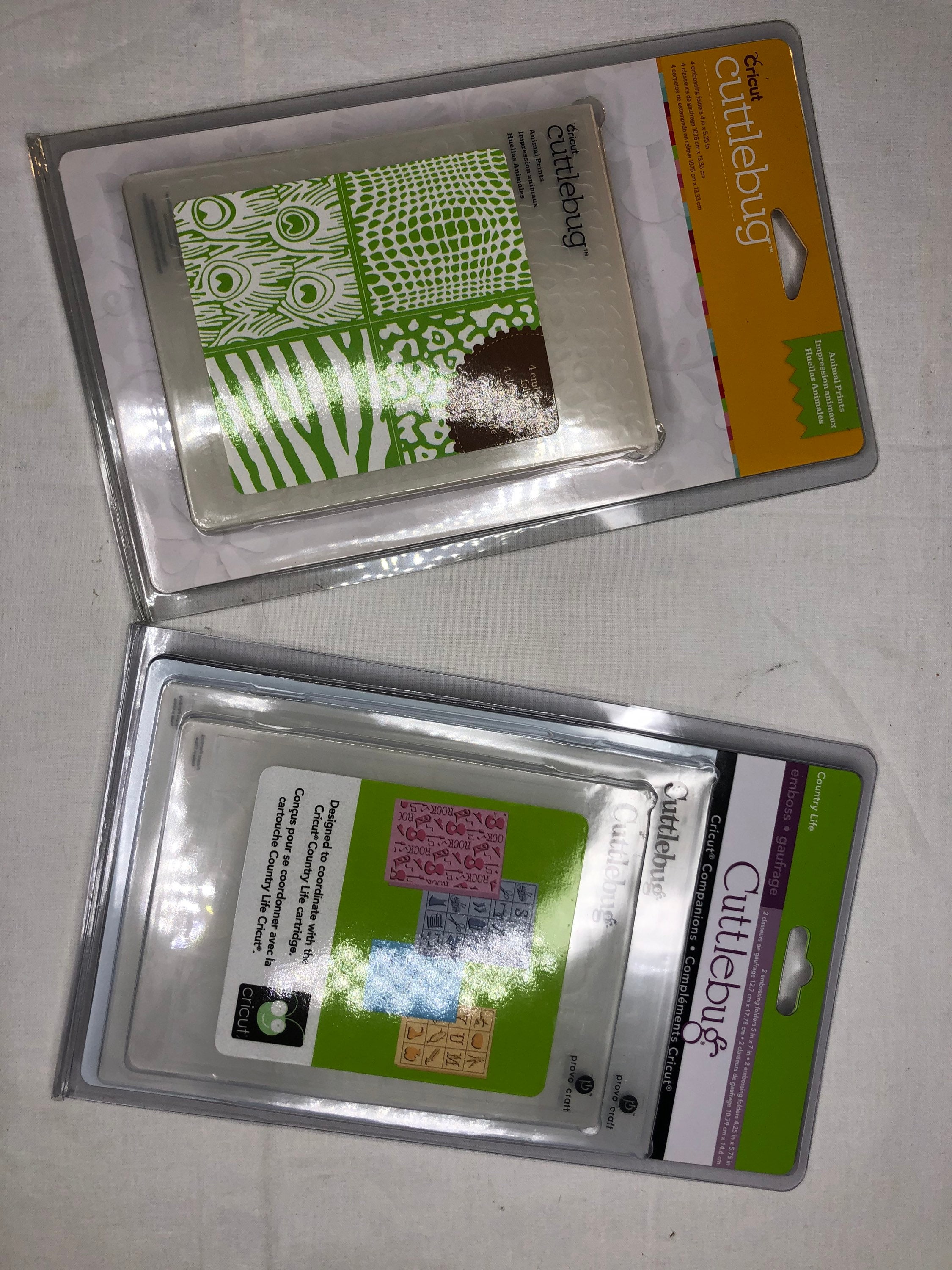 Cricut Cuttlebug Embossing Folders New in Packaging Animal Prints and  Country Life 8 Total Folder Plates 