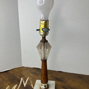 May include: A set of three ceramic mugs with a speckled, matte finish. The mugs are in shades of cream, light gray, and dark gray. Each mug has a simple, minimalist design, perfect for coffee or tea.