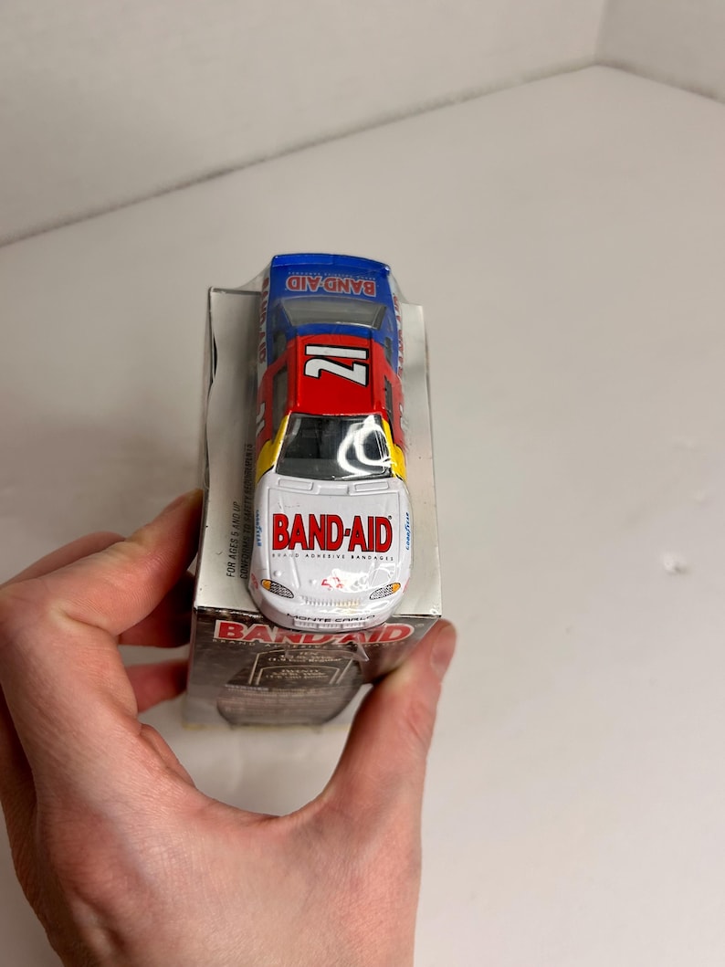 Vintage Johnsons & Johnson NASCAR Racing Bandaid Kit With Model Cast