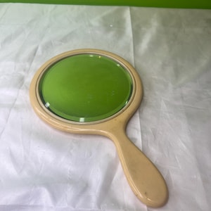 Vintage Art Deco Era Celluloid or French Ivory Hand Mirror with Beveled Glass