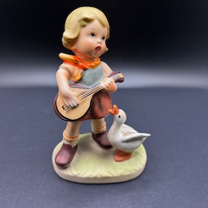 Vintage Porcelain Handpainted Farm Girl with Banjo and Goose Figurine