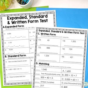 May include: Black and white worksheet with the title "Expanded, Standard & Written Form Test". The worksheet includes multiple choice questions and fill-in-the-blank questions about writing numbers in expanded, standard, and written form.