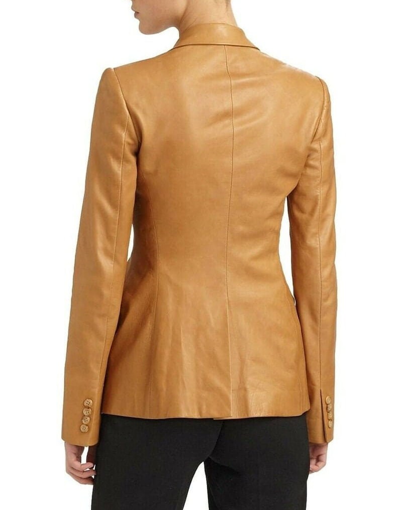 May include: A tan leather blazer with a notched collar and long sleeves. The blazer has a single-breasted closure and two front pockets.