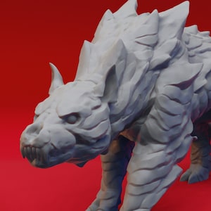May include: A gray, detailed, 3D printed miniature of a creature with sharp teeth and claws. The creature has a spiky, armored body and a fierce expression.