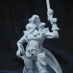 May include: A white 3D printed figurine of a woman wearing a long coat and holding a pistol. She is standing on a round base.