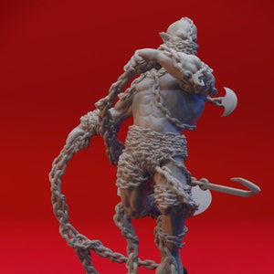 May include: A gray 3D printed miniature of a humanoid figure bound in chains, holding a hook and axe. The figure is standing on a circular base.