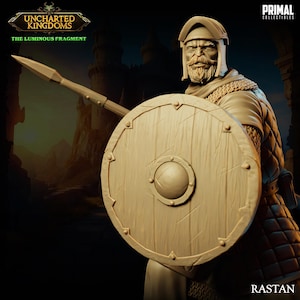 May include: A detailed miniature figurine of a warrior with a beard, wearing a helmet and chainmail armor, holding a spear and a round wooden shield with a metal boss. The figurine is painted in shades of brown and beige. The background is a dark, blurry image of a castle.