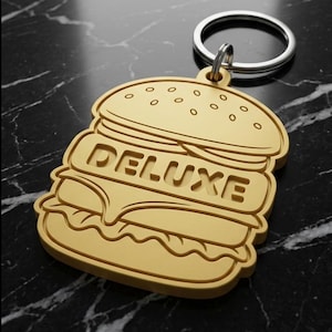 May include: A rustic wooden sign with the text "Welcome" in a handwritten style. The sign is painted white with a distressed finish, and features a decorative floral element in the corner. The background is a blurred image of a wooden surface.