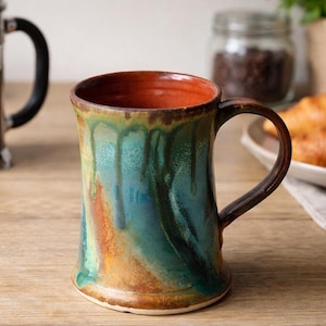 Rustic Ceramic Mug – 300ml – Blue & Green Drip Glaze – Red-Brown Interior – Handmade Pottery from Australia