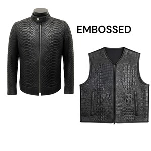 May include: Black embossed leather jacket and vest. The jacket has a stand-up collar and a zipper closure. The vest has a V-neck and a zipper closure. The word "EMBOSSED" is printed in black.