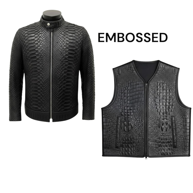 May include: Black embossed leather jacket and vest. The jacket has a stand-up collar and a zipper closure. The vest has a V-neck and a zipper closure. The word "EMBOSSED" is printed in black.