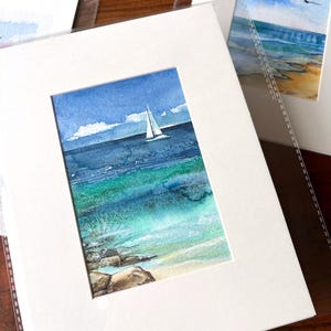 Original watercolour painting of the sea with a sailboat