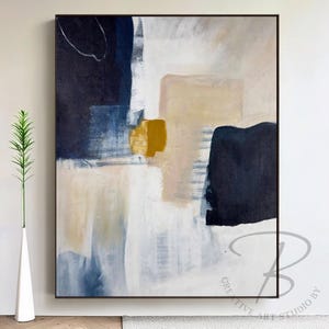 a painting hanging on a wall next to a vase
