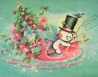 Scarica la cartolina di Natale rosa con pupazzo di neve e slitta degli anni '50