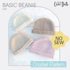 May include: Four crocheted beanies in different colors: white, beige, light brown, and lavender. The beanies are laid out on a white wooden surface. The text "BASIC BEANIE HAT" is at the top of the image. The text "Odd Dolli" is in the top right corner. The text "NO SEW" is in a yellow circle in the bottom right corner. The text "Crochet Pattern" is in a blue rectangle at the bottom of the image.