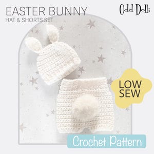 May include: A white crochet Easter Bunny hat and shorts set. The hat has bunny ears, and the shorts have a fluffy tail. The words "EASTER BUNNY HAT & SHORTS SET" are at the top. The words "Crochet Pattern" are at the bottom.