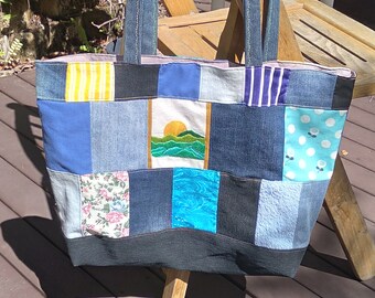 Sun on the hills tote bag