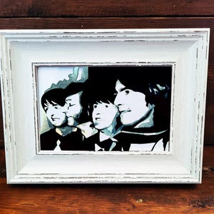 Mini lámina artística de los Beatles: 17 x 12 cm, historia del rock enmarcada. Mini lámina de escritorio de los Beatles.