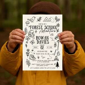 May include: A white invitation with black illustrations and text, held by a person wearing a yellow jacket. The invitation reads "Forest School Adventure" and includes details for Rowan Davies, date, time, and location. It also has illustrations of a bird, backpack, and hiking boots.