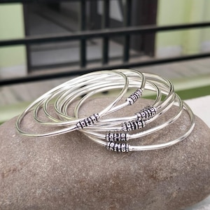 Handmade Sterling Silver Bangle Set: Stackable Designer Bangles