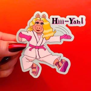 Miss Piggy with a left hook, Hiii-Yah! The Muppets: water-resistant sticker, handwash only, for indoor use, not UV resistant