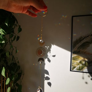 The Suncatcher Mini Moon Small sun catcher with moon, moon phase and rainbow crystal for hanging in the window with a rainbow effect image 6