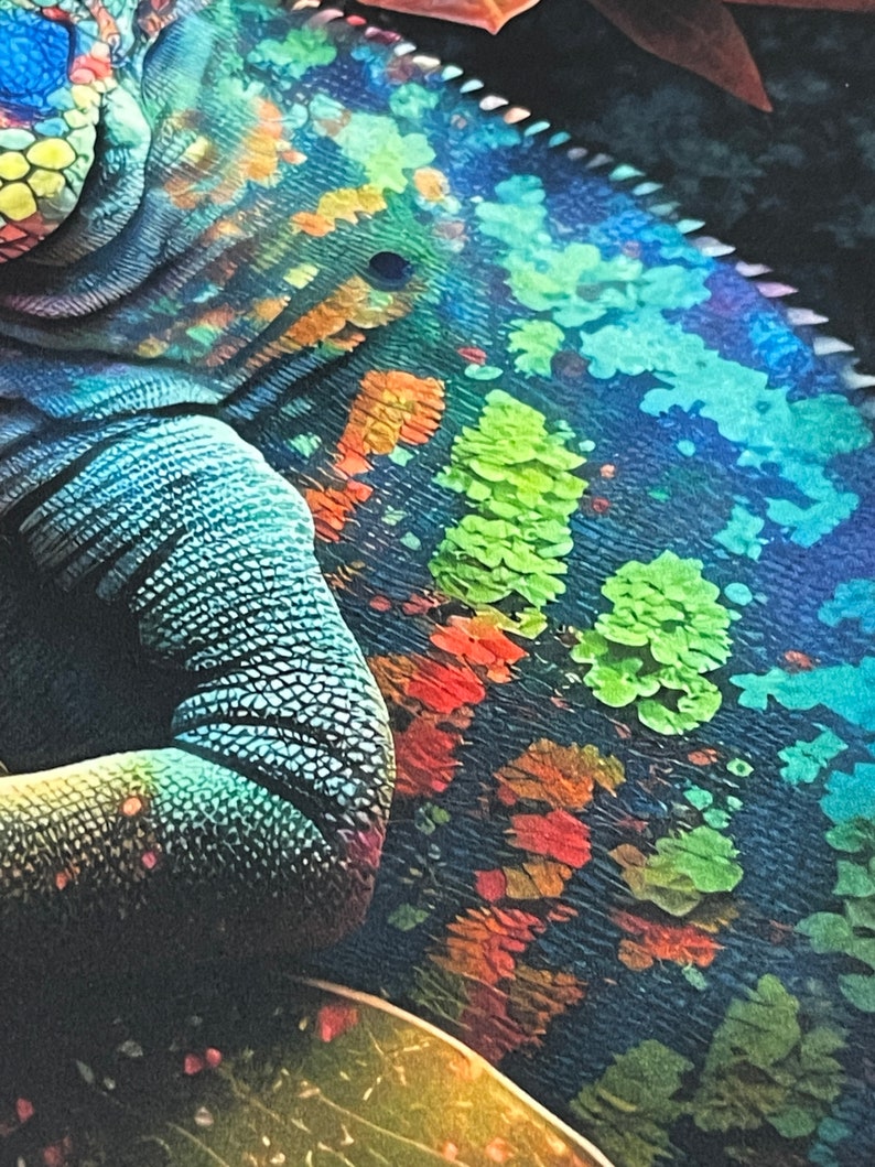 May include: Close-up of a chameleon's skin, showing intricate patterns of blue, green, orange, and red. The scales are visible and create a textured surface.