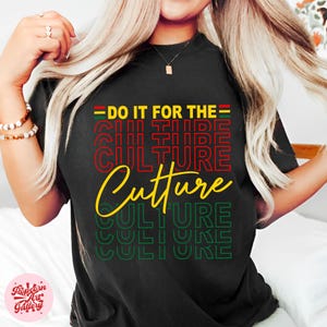 May include: Black t-shirt with the text "Do it for the Culture" in yellow, red, and green. The text is repeated multiple times in a stacked design.