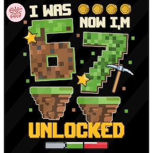 May include: Black graphic design with the text "I WAS 67 NOW I'M UNLOCKED". The numbers 6 and 7 are designed to look like blocks from a video game. The design includes pixelated elements, gold coins, and a pickaxe.
