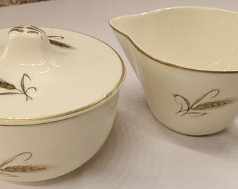 Cream and sugar bowl with lid. Royal Joci hand painted with 23k gold.