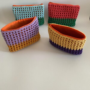 Elevate your beauty routine with this beautiful handcrafted Crochet Makeup Bag. Expertly designed for the modern individual who appreciates function fused with style, this makeup bag is a chic way to keep your favorite cosmetics organized.