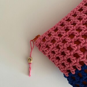 Elevate your beauty routine with beautiful handcrafted Crochet Makeup Bag. Expertly designed for the modern individual who appreciates function fused with style, this personalized makeup bag is a chic way to keep your favorite cosmetics organized.