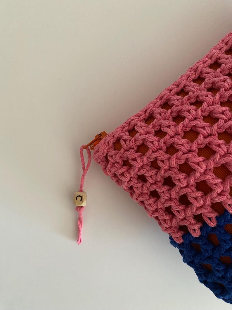 Elevate your beauty routine with beautiful handcrafted Crochet Makeup Bag. Expertly designed for the modern individual who appreciates function fused with style, this personalized makeup bag is a chic way to keep your favorite cosmetics organized.