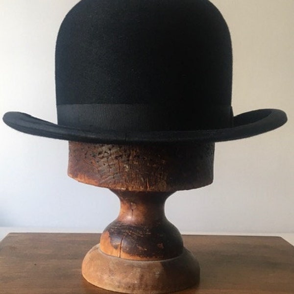 Vintage black bowler hat.